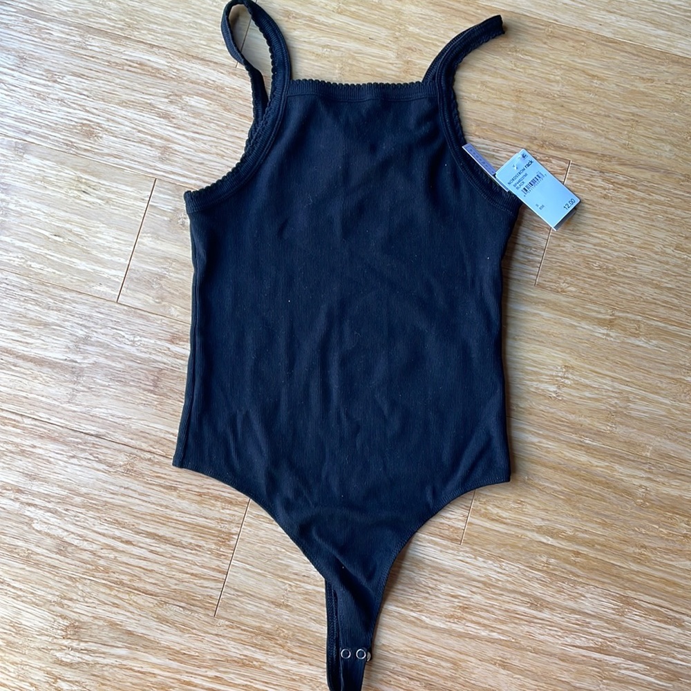 New black bodysuit with clasp for easy removal and thong back